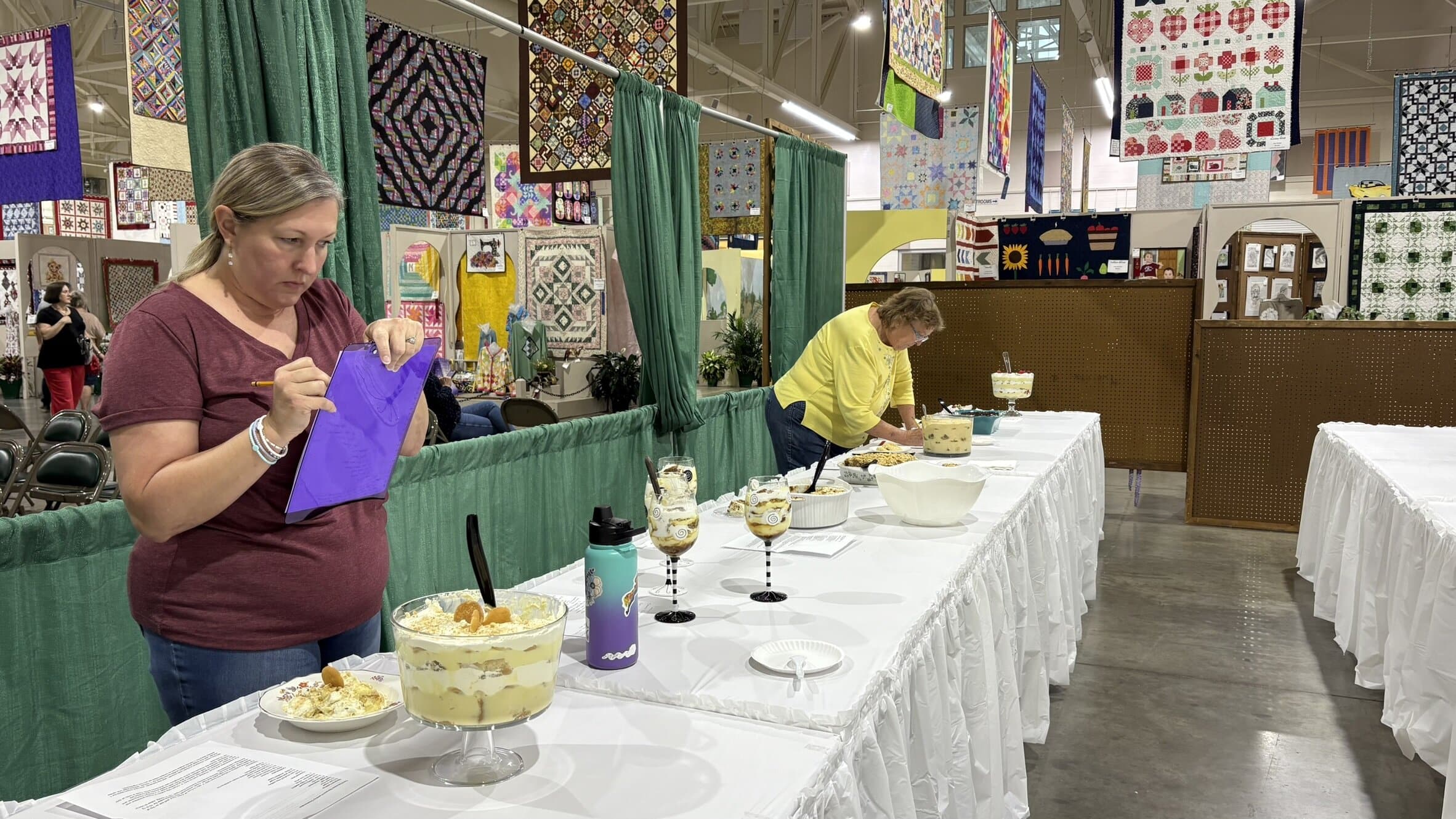 Lisa Deal and Chris Mayo judge entries in the Best Banana Pudding Contest at the Georgia National Fair in Perry, Goergia on Saturday, October 11/ Photos by Hanna Raskin